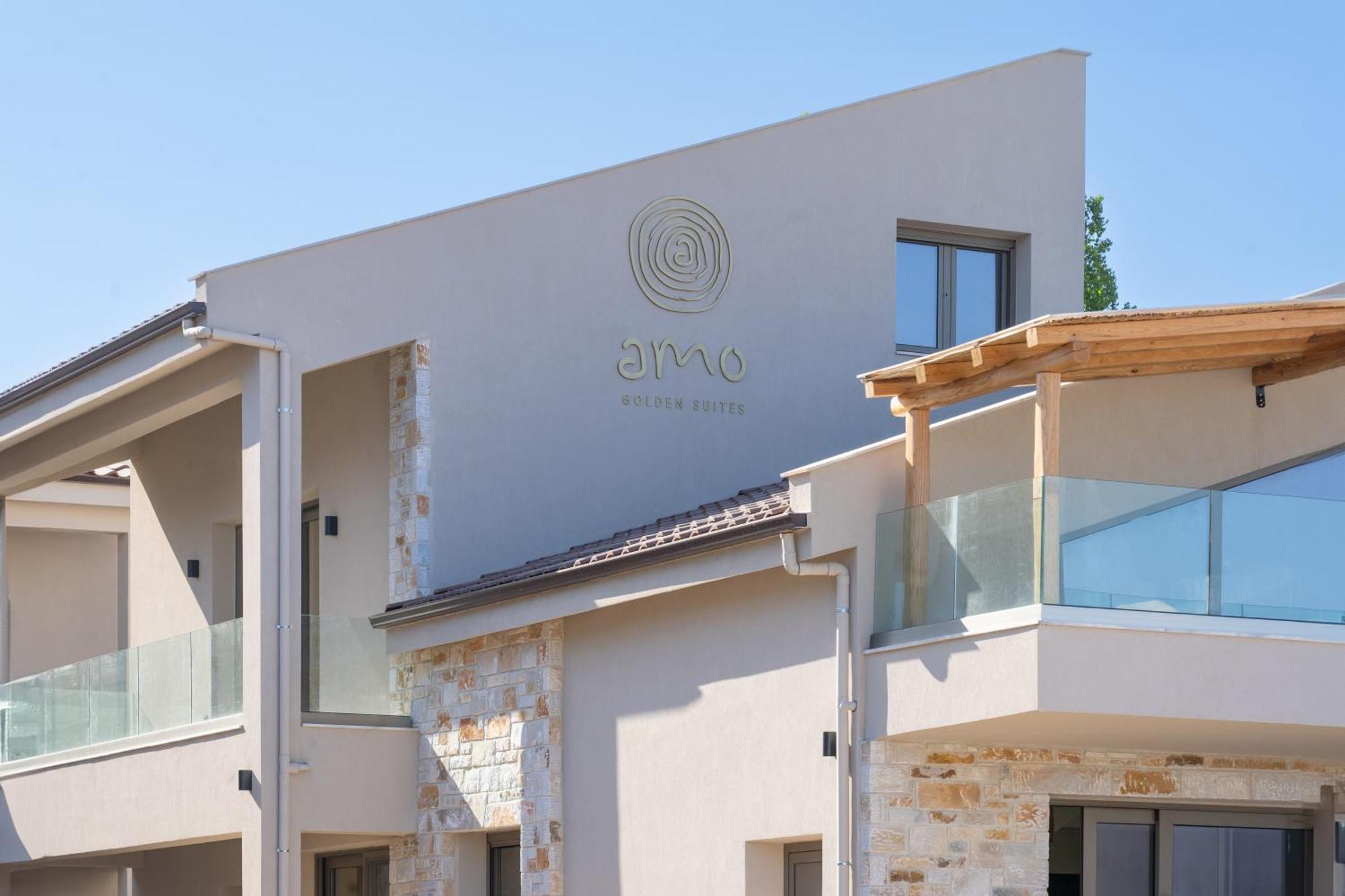 Amo Golden Suites Chrysi Ammoudia Bagian luar foto