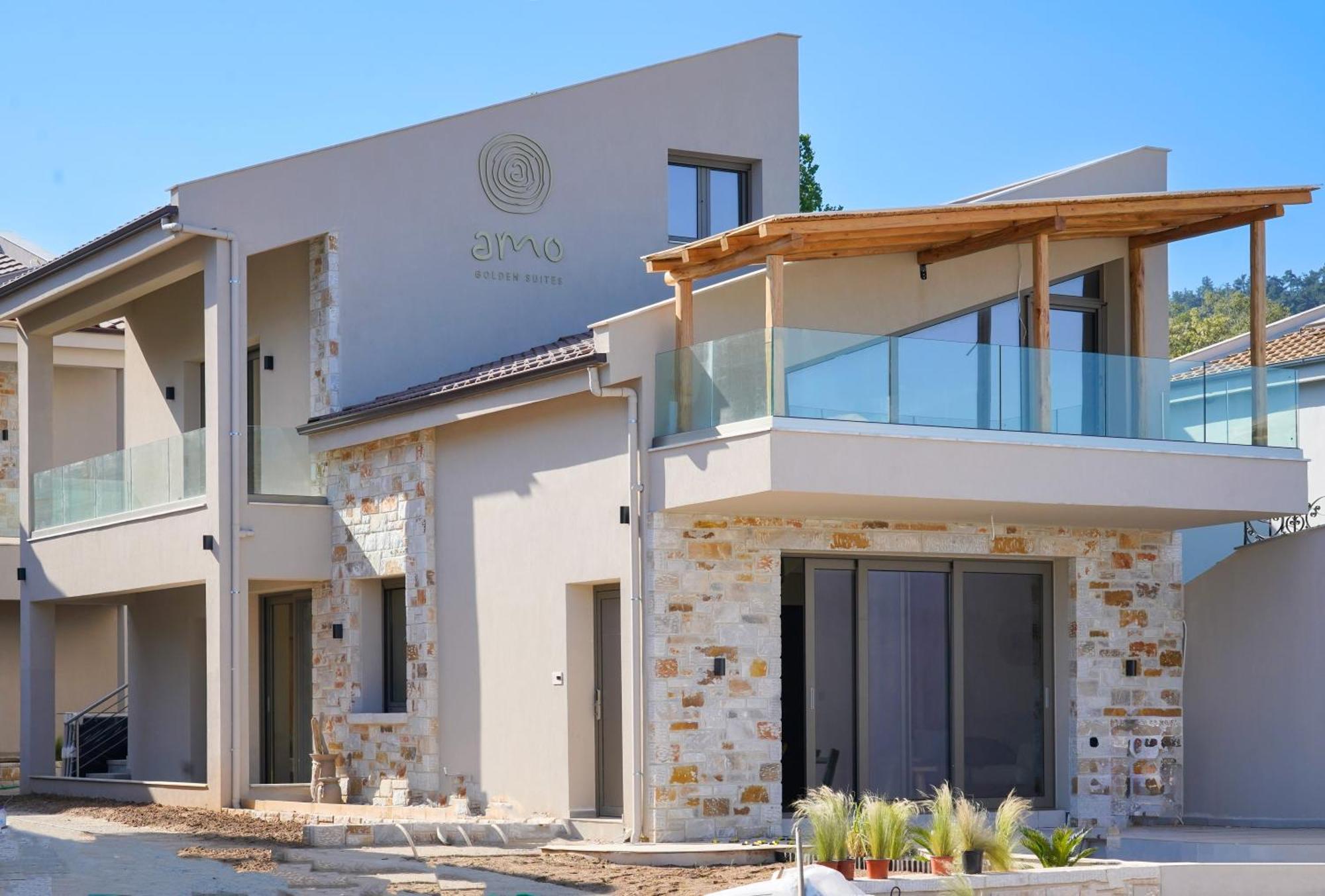 Amo Golden Suites Chrysi Ammoudia Bagian luar foto